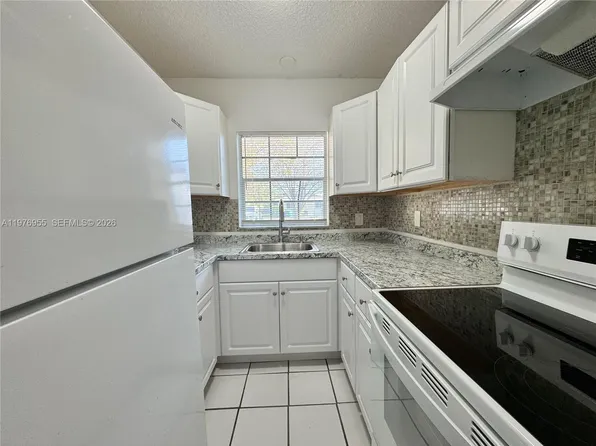 4140 Woodside Dr APT 107, Pompano Beach, FL 33065