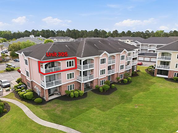 2nd image of 4877 Dahlia Ct. #305