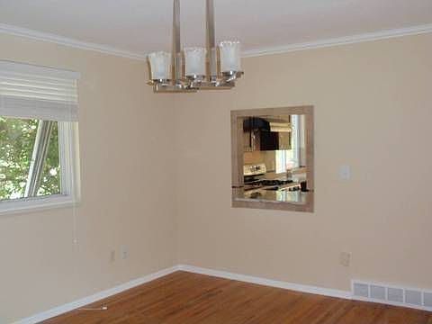 Serving window into Dining room