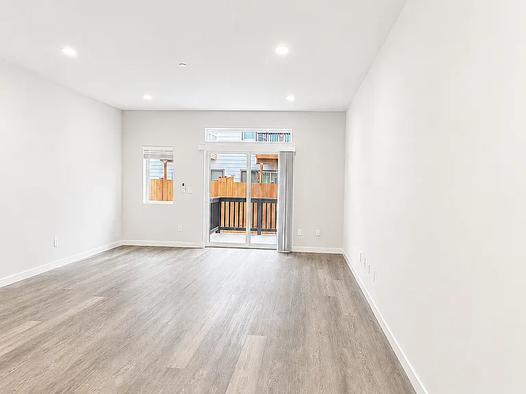 LIving room with attached balcony