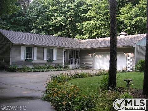Front view of home.  Almost 3/4 acre lot, in Grand Haven Township