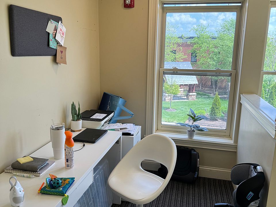 This unit has its own private entrance. After climbing up the stairs, the area can be used as office space or storage