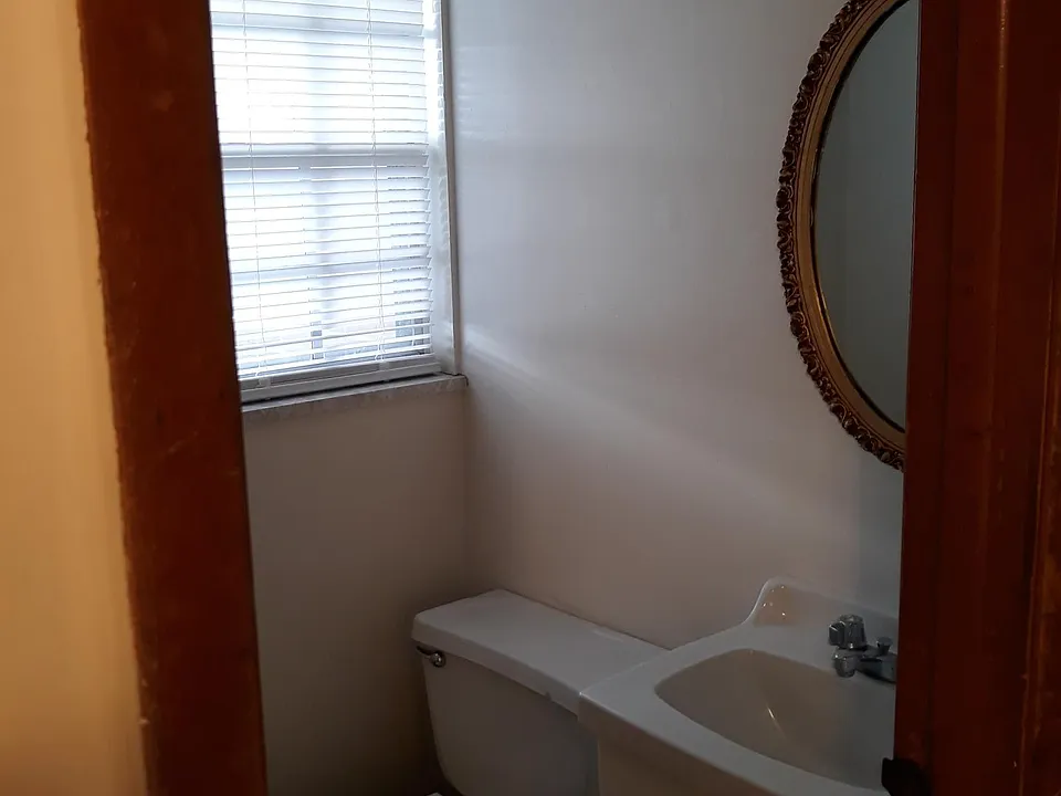 Half Bath on Main Floor just off the Dining Area
