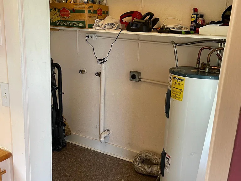 Utility/storage room now has newer washer/dryer (not shown).