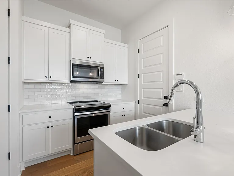 308 E 19th 1/2 St #308 — Photo 13