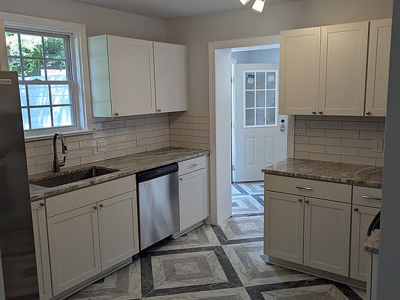 gorgeous kitchen with plenty of light and all new appliances