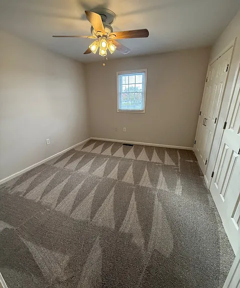 Master Bedroom, new carpet, freshly painted, ceiling fan/light. Fits a queen size or king size bed.