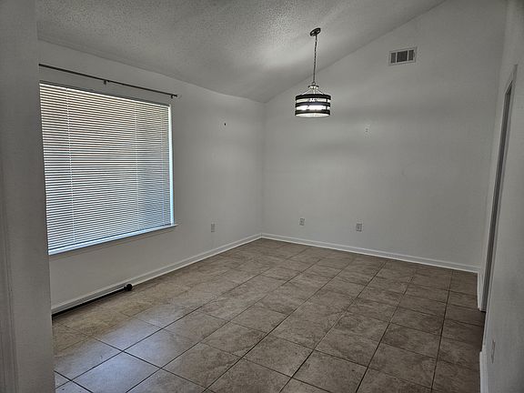 Formal living/dining room or can be used as an office.