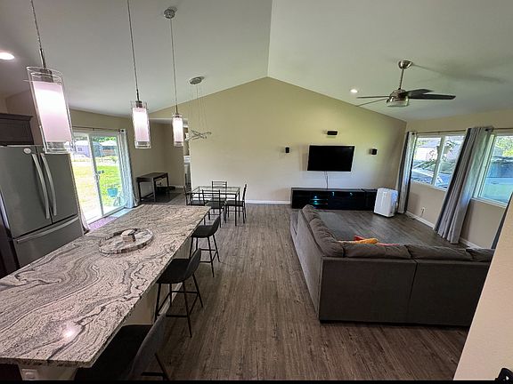 High ceilings, large windows and open concept design