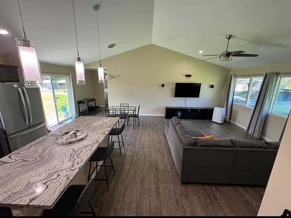 High ceilings, large windows and open concept design