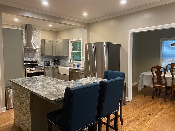 Enter the home to open concept kitchen (to the right).