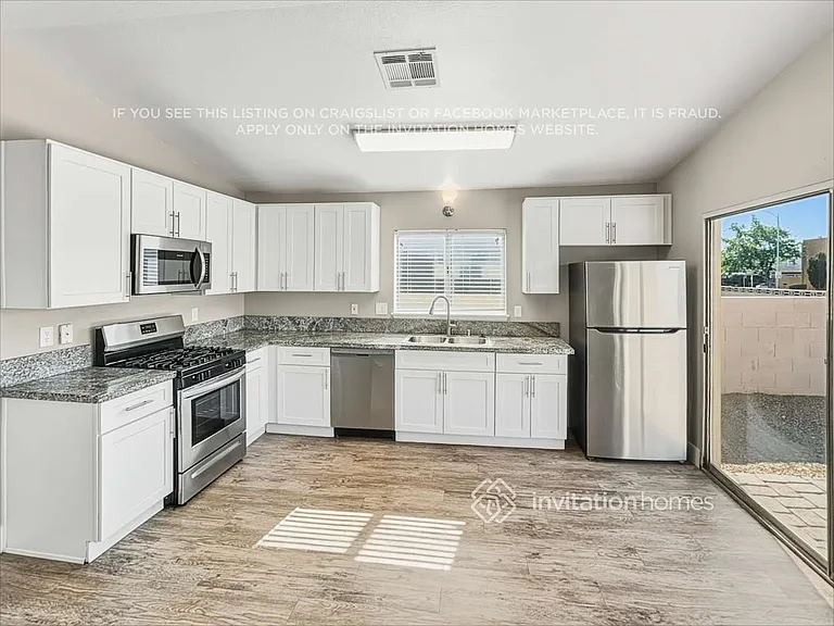 6357 Greyhawk Ave — Photo 7