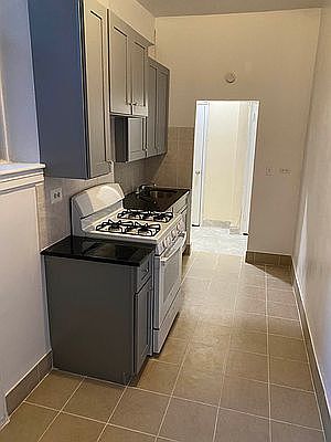4th image of 66-20 Wetherole St #5A