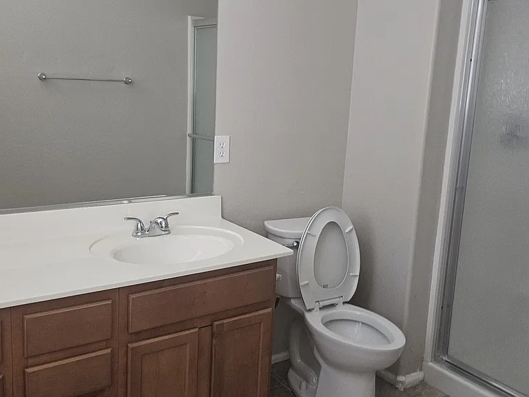 Main bath with Walk in Shower and large walk in closet