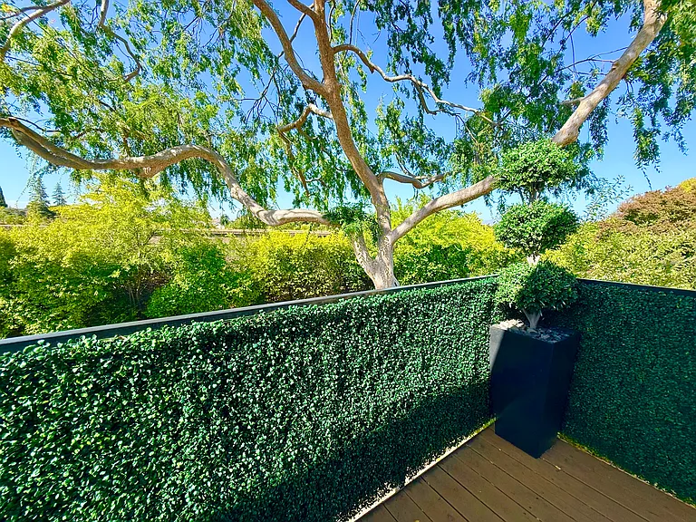 Tranquil tree-lined views from the balcony deck