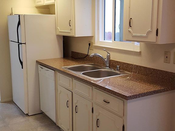 Refrigerator 2 years old. Valance over sink has been remove