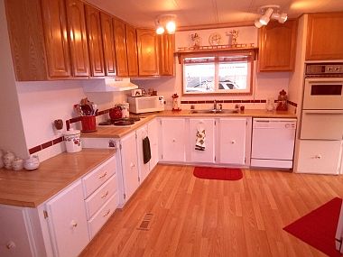 The remodeled kitchen just shines! Lots of counter space,lots of cupboards,a pantry,double ovens & m