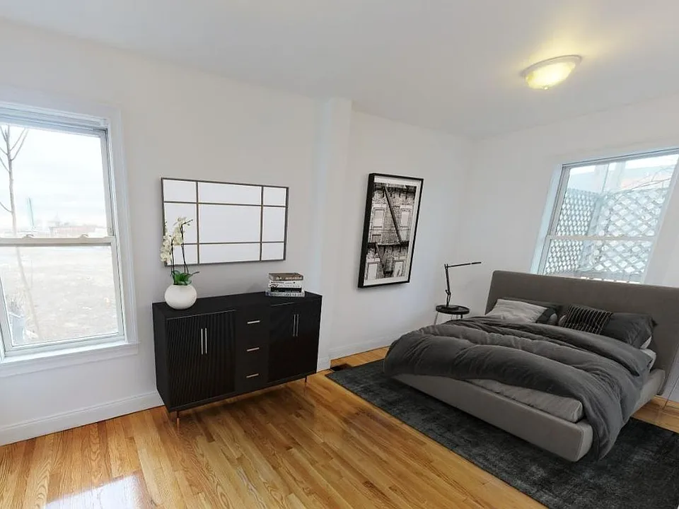 Bedroom 2. This image shows a virtually furnished space. Bedrooms come unfurnished.
