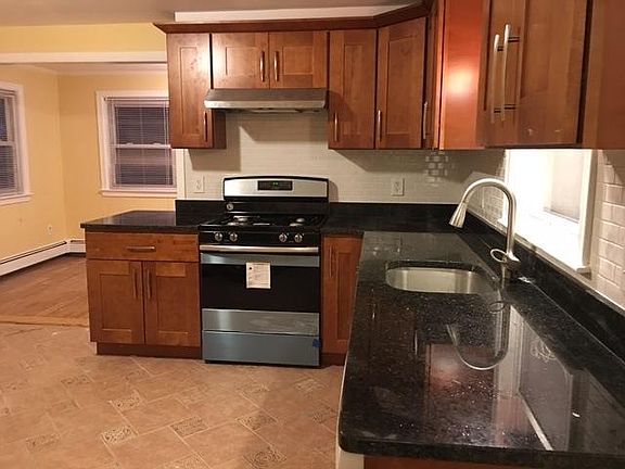 Brand new kitchen with granite countertop