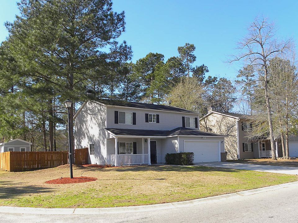 This corner lot is privacy fenced and has room for parking behind the gate