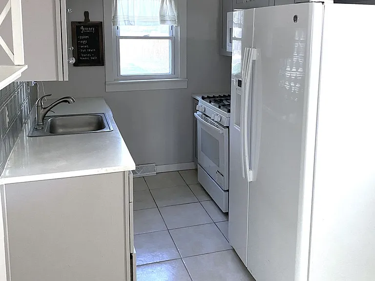 5557 E Asbury Ave — Photo 7