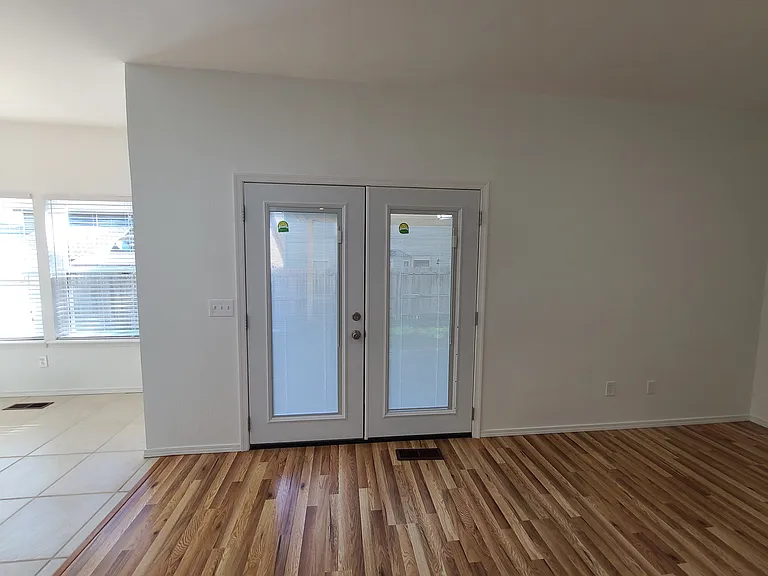 French doors leading to backyard