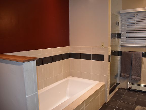 Separate tub and shower.