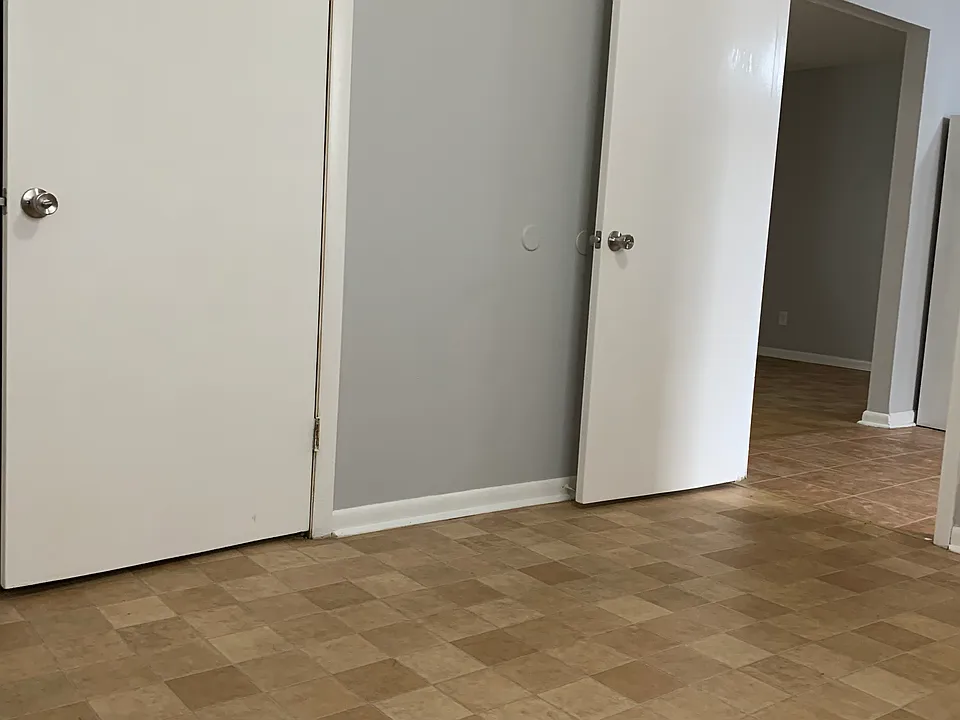 Looking from the bedroom out towards the kitchen & living room.