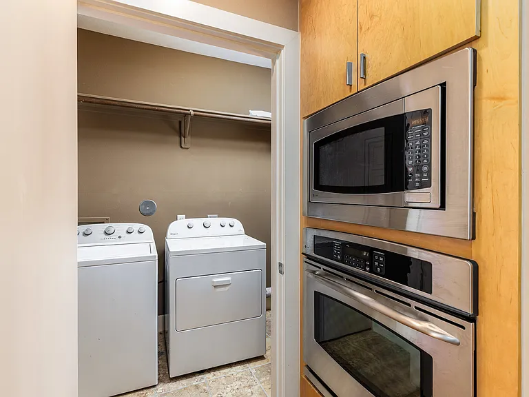 Washer and dryer off kitchen