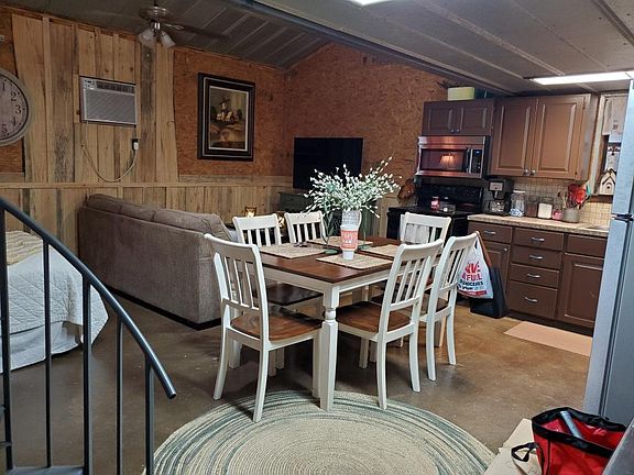 Inside home while furnished. Home can be utilized as Efficiency.
 Home does NOT come furnished.