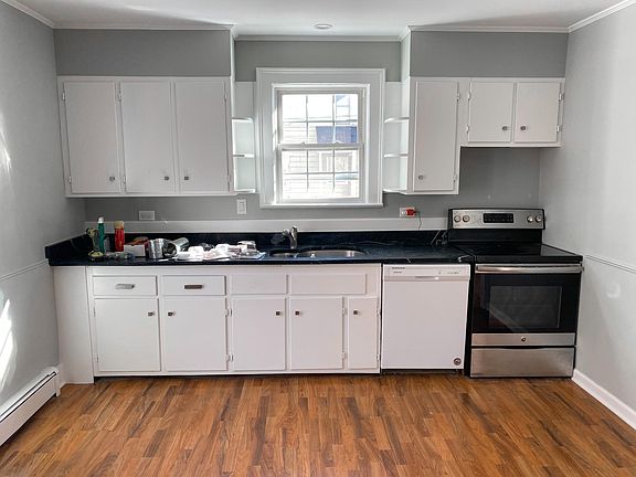Kitchen (Work in Progress during photo, new microwave has been installed and refrigerator is behind camera person)