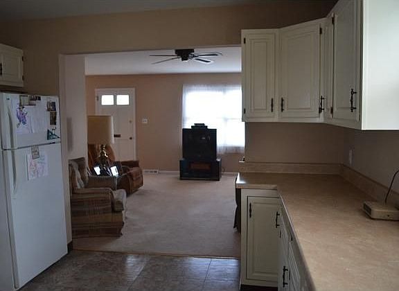 Kitchen leading into Living Room