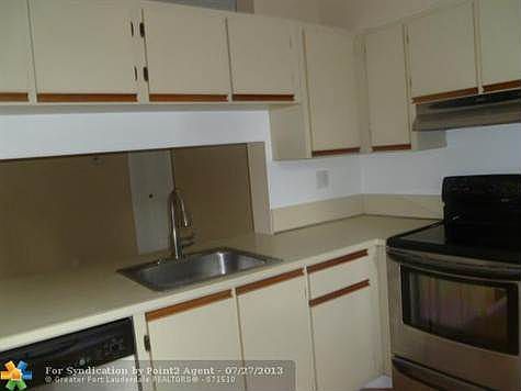 1st image of 614 Gardens Dr APT 204