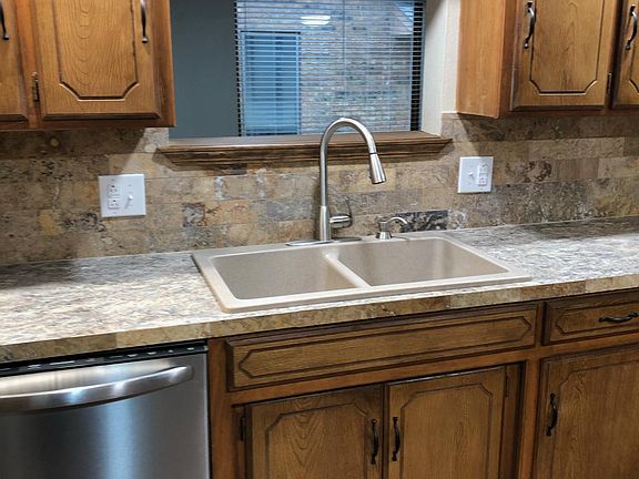 New sink, fixtures, and dishwasher
