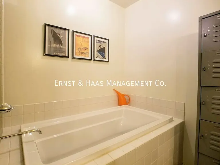 115 W 4th St #210 — Photo 36