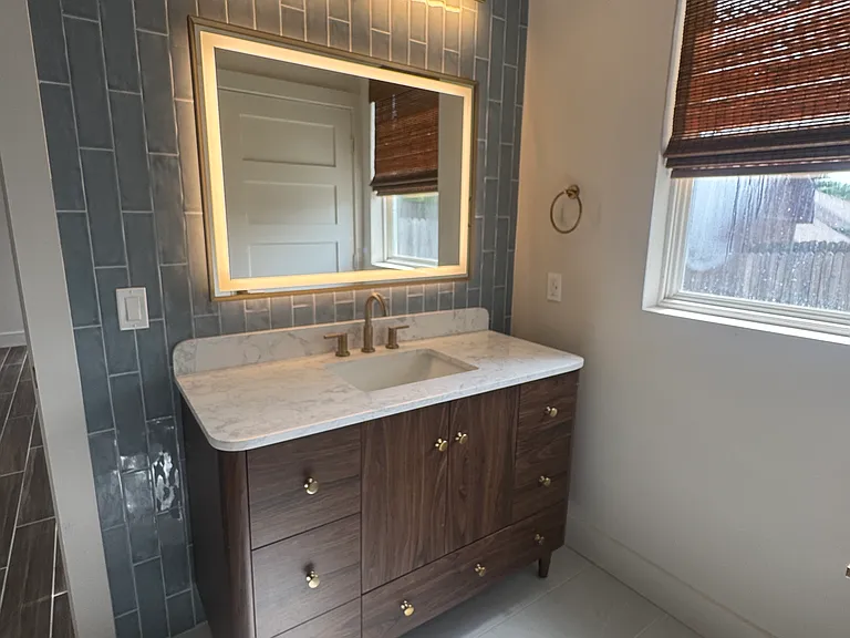 2 vanities with LED mirrors
