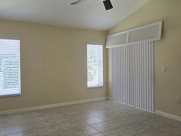 Primary Bedroom with Slider off of Screened Lenai