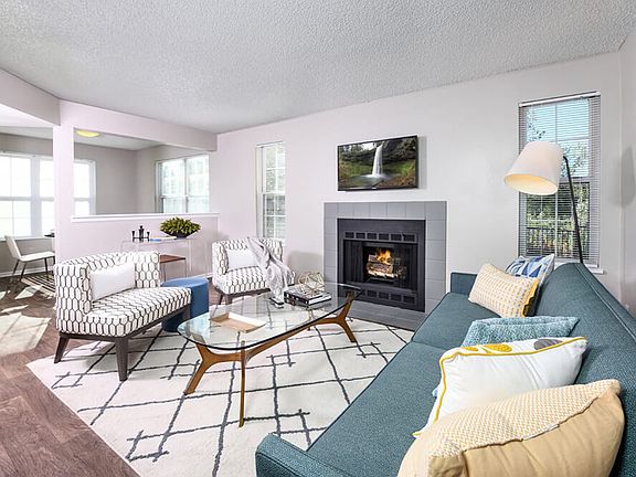 Keep cozy next to the fireplace while watching a movie