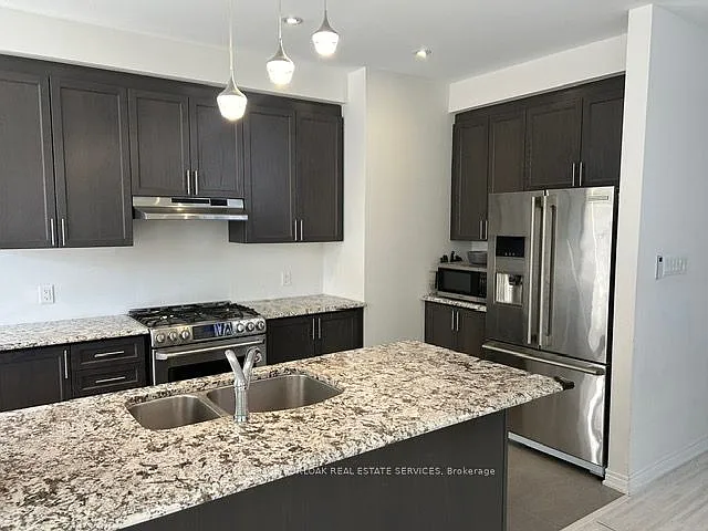 57 Macbean Cres — Photo 31