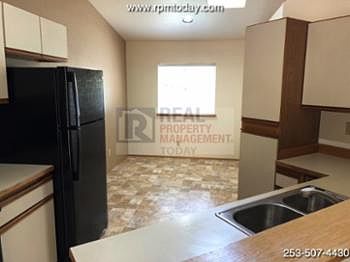 4th image of 3409 71st Ave Ct W