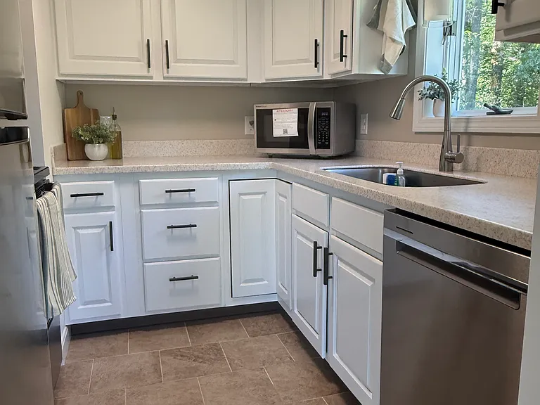 Kitchen with brand new stainless steel appliances