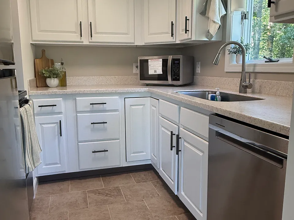 Kitchen with brand new stainless steel appliances