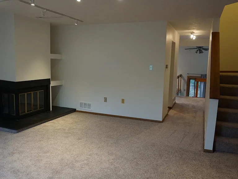 Living room to kitchen/dining area and second floor