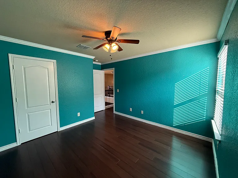 4th bedroom is great sized with lots of room and a nice window to enjoy the light from outside