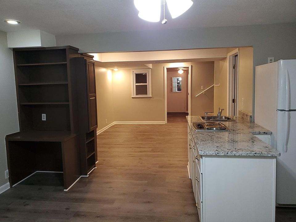 Living and dining room with built in shelves