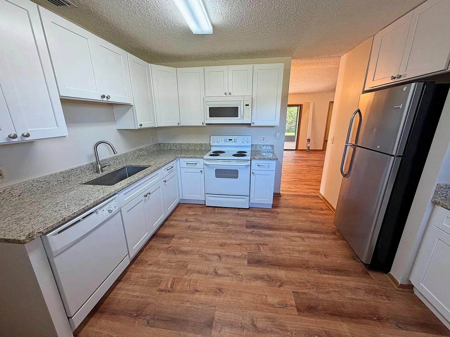 Beautiful 3-bedroom, 2-bathroom home offering 1,676 square feet of comfortable living space — Photo 4