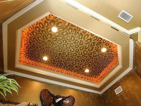 Concealed rope lighting features in the dramatic entry ceiling. This entire home has many custom features