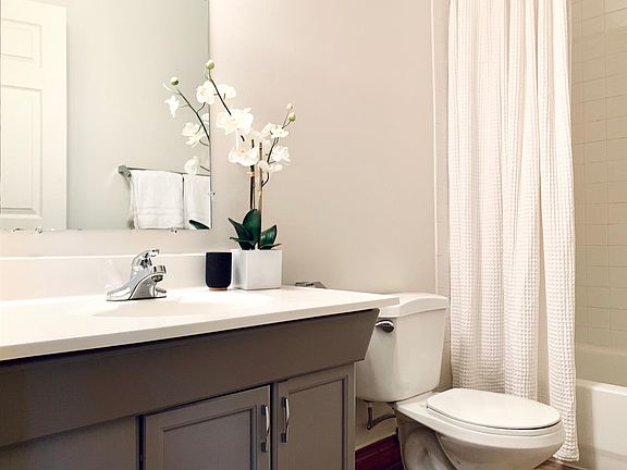 Updated bath with full tub and shower