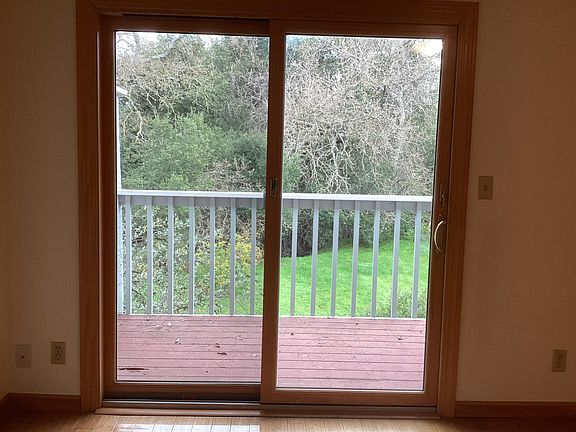 Upstairs Balcony off the Master Bedroom with view of creek