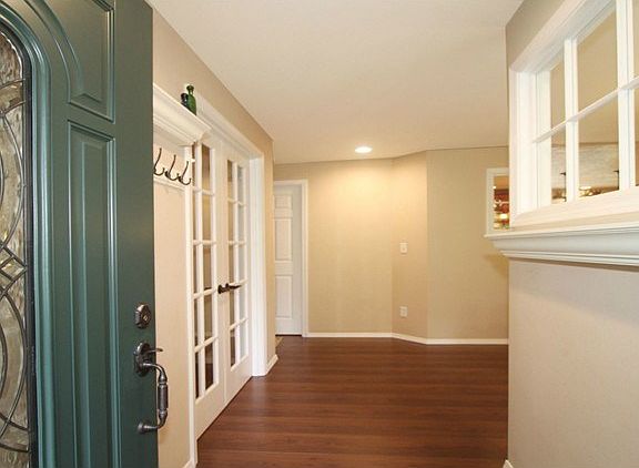 Welcome! Inside the entryway are French doors to the office, wit